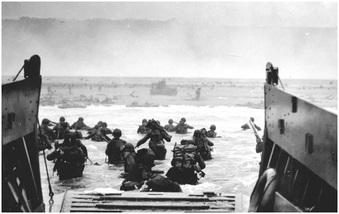 Normandy June 6th 1944 US troops assault Omaha Beach during the D Day landings robert capa