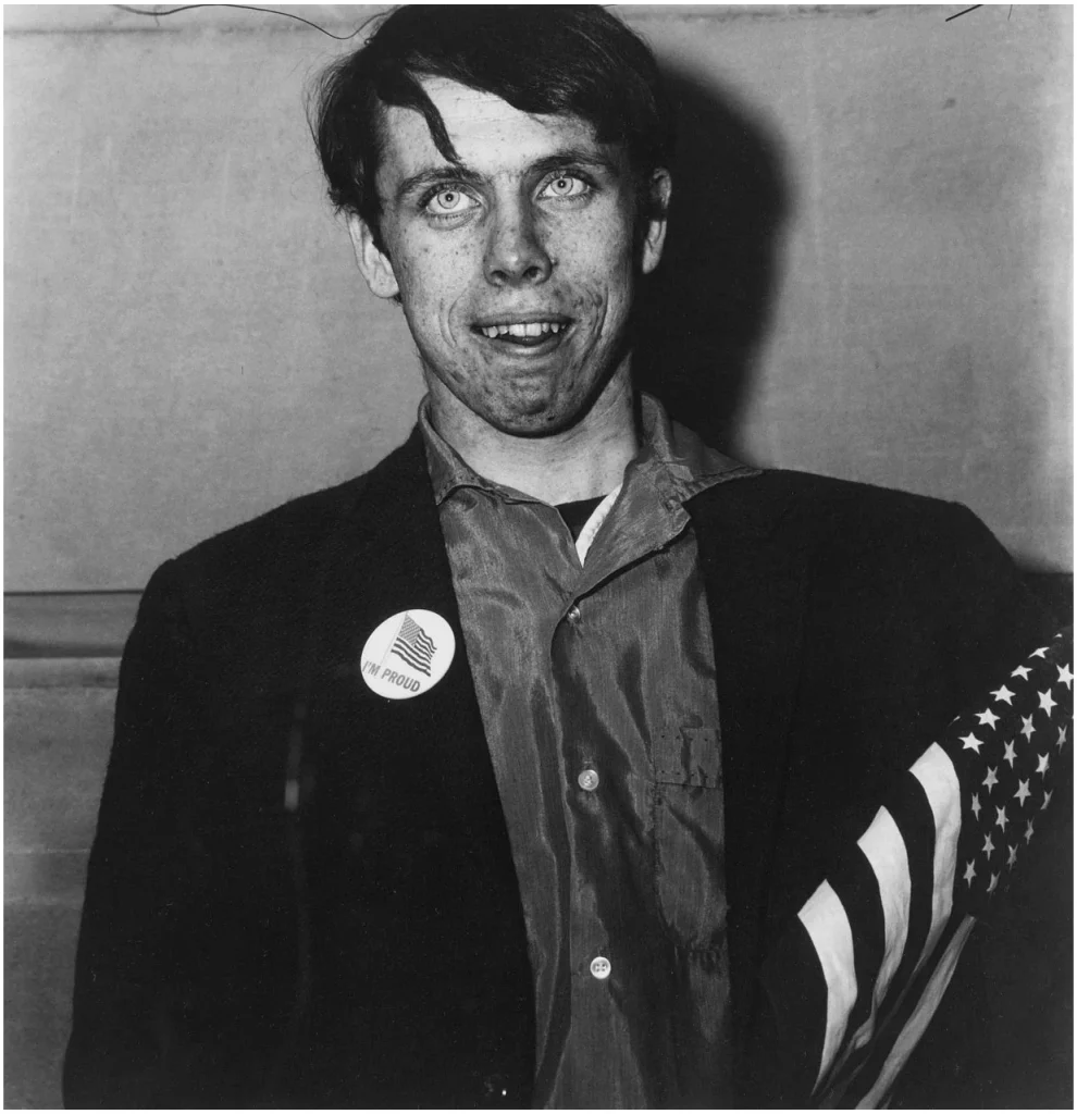 Patriotic Young Man with Flag NYC 1967 diane arbus