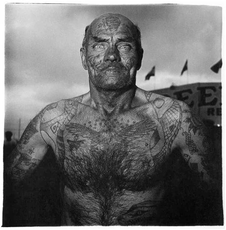 tattoed man at a carnival 1970 Diane Arbus